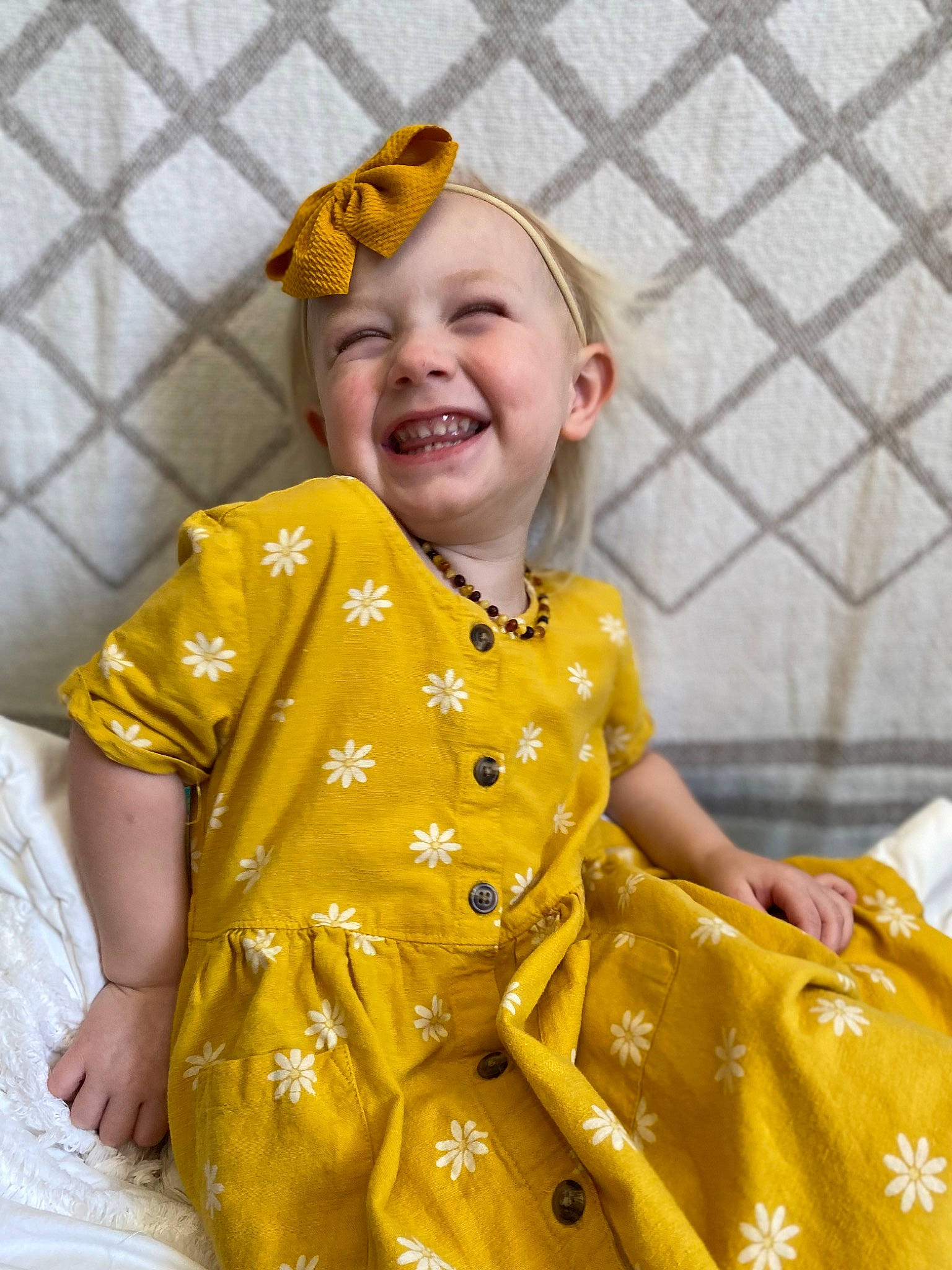 Lilly joined the competition — help win amazing prizes! baby, baby_toddler_clothing, child, event, face, facial_expression, fashion_design, fun, hairstyle, happy, head, human, joy, outerwear, pattern, person, sleeve, smile, t_shirt, toddler