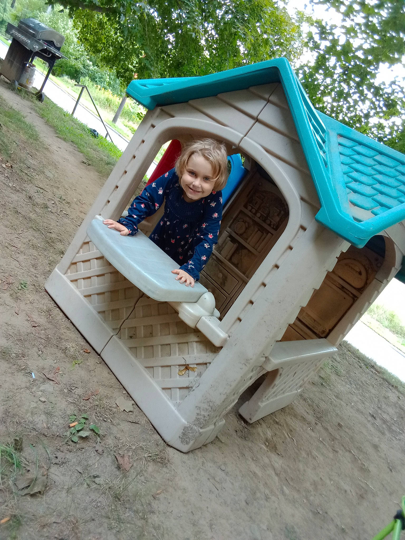 Jaylah is registered to the contest to win money with this photo: chute, city, fun, grass, green, house, joy, leisure, outdoor_furniture, outdoor_play_equipment, person, plant, playground, playground_slide, recreation, shorts, smile, swing, t_shirt, toddler
