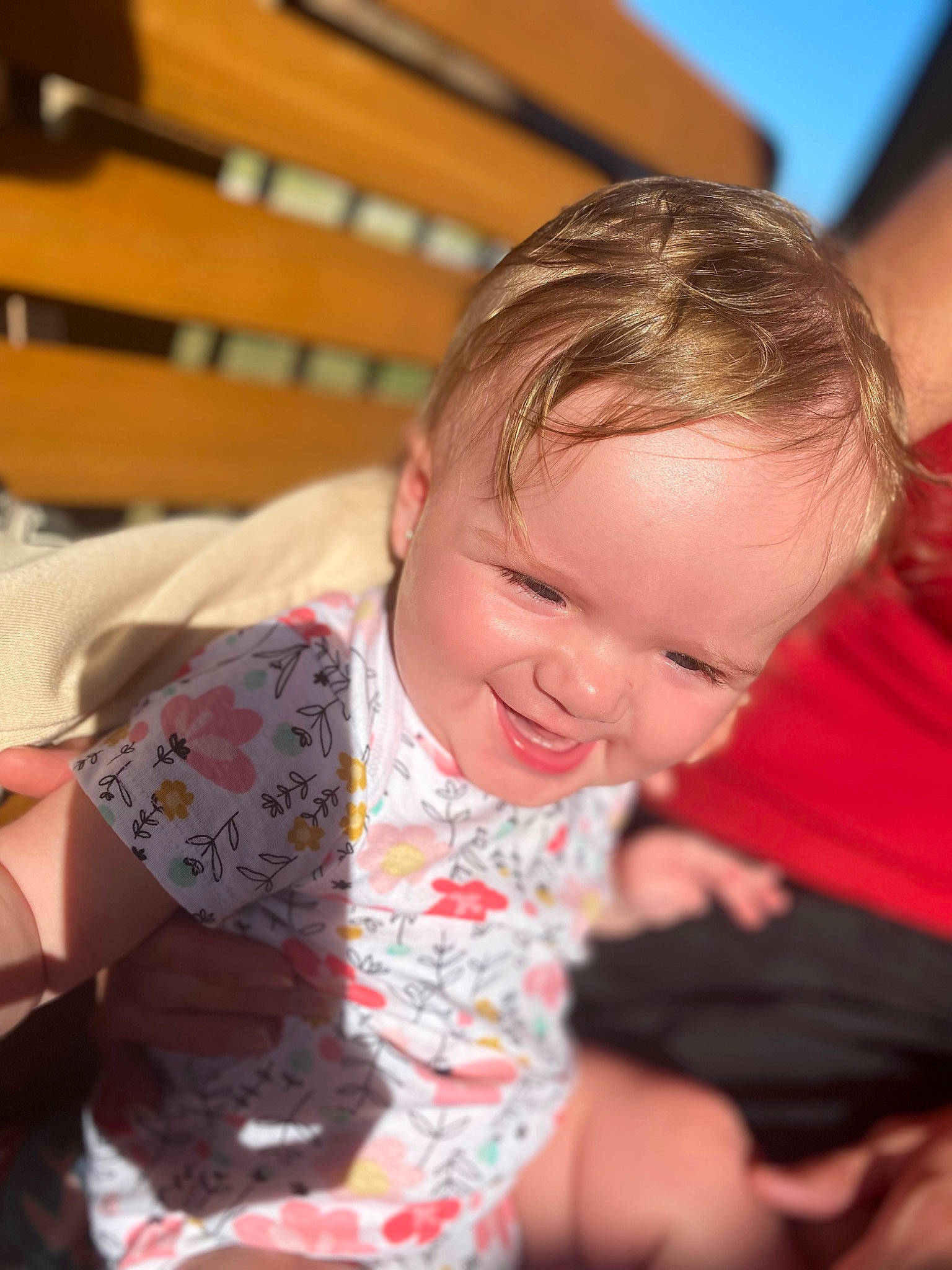 Ayla is registered to the contest to win money with this photo: baby, baby_toddler_clothing, cheek, child, elbow, flooring, fun, happy, human_body, iris, joy, laugh, person, play, sitting, skin, sleeve, smile, t_shirt, toddler