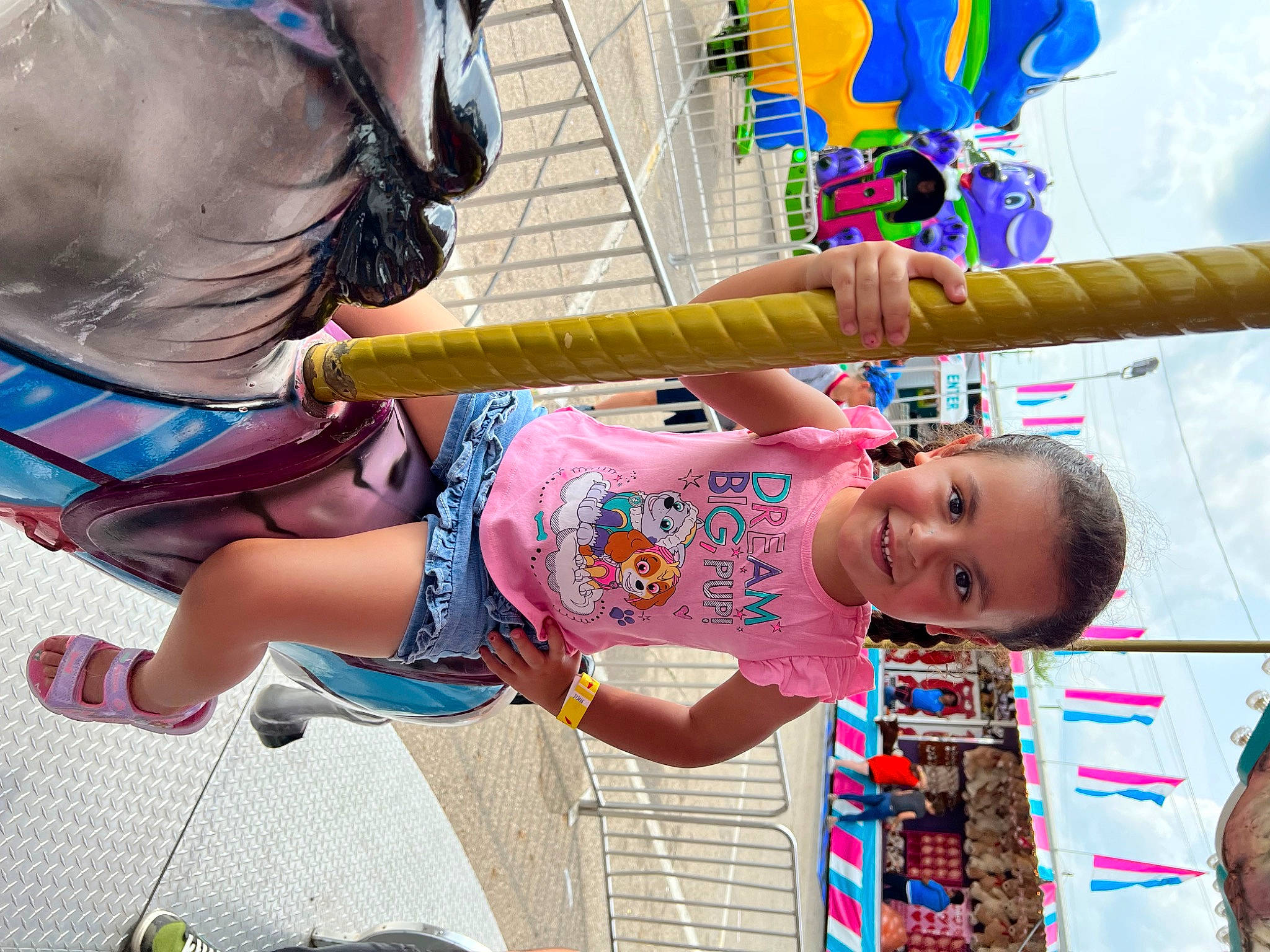 Janiyah is registered to the contest to win money with this photo: blue, child, city, eyewear, fun, happy, human_leg, joy, leisure, magenta, person, personal_protective_equipment, pink, recreation, shorts, smile, snapshot, summer, thigh, toddler