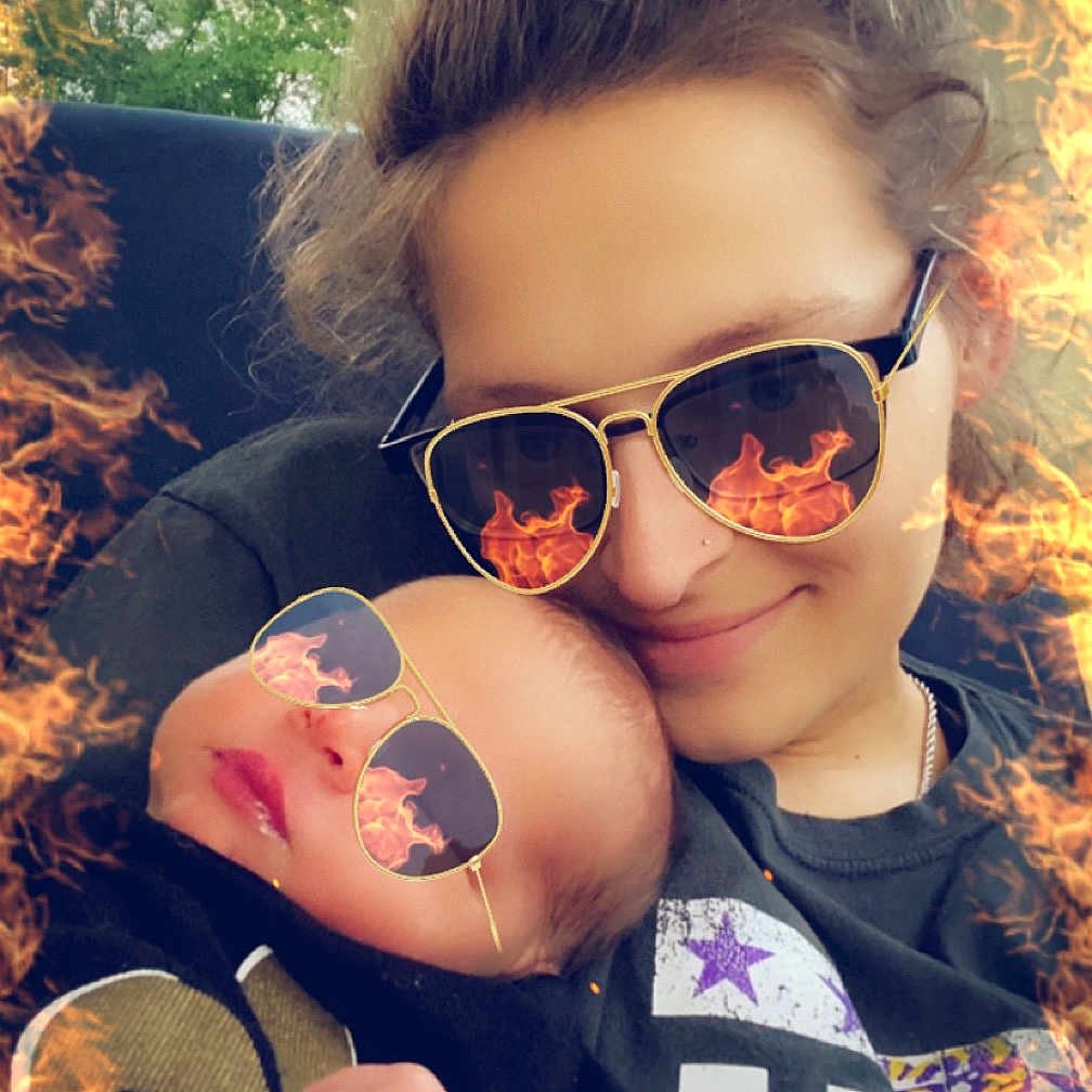 Remington Jr. is registered to the contest to win money with this photo: accessories, baby, blonde, bodypart, face, finger, glasses, hair, hand, happy, head, outdoors, person, photography, plant, portrait, selfie, smile, sunglasses, tree