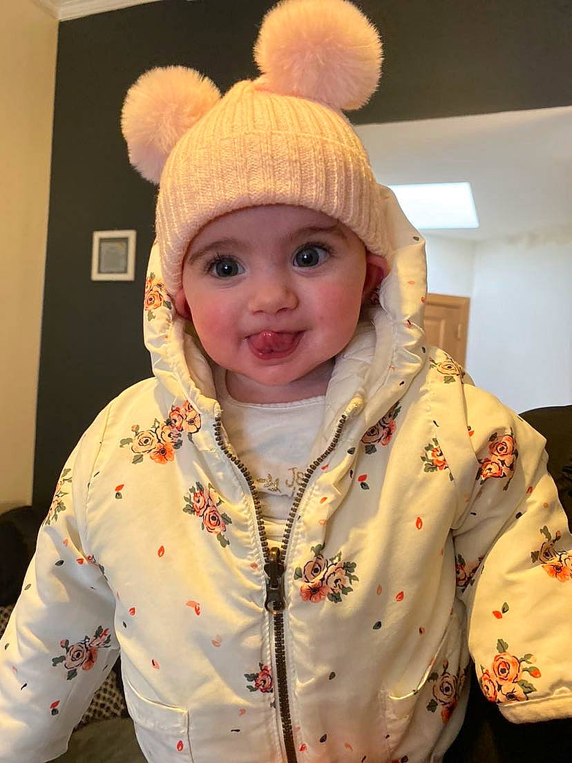 Nathalia a rejoint le concours — aidez-le/la à gagner de superbes lots ! baby_toddler_clothing, cap, cheek, child, collar, eye, face, fashion_accessory, fun, happy, headwear, jacket, knit_cap, lip, organ, outerwear, person, sleeve, smile, toddler