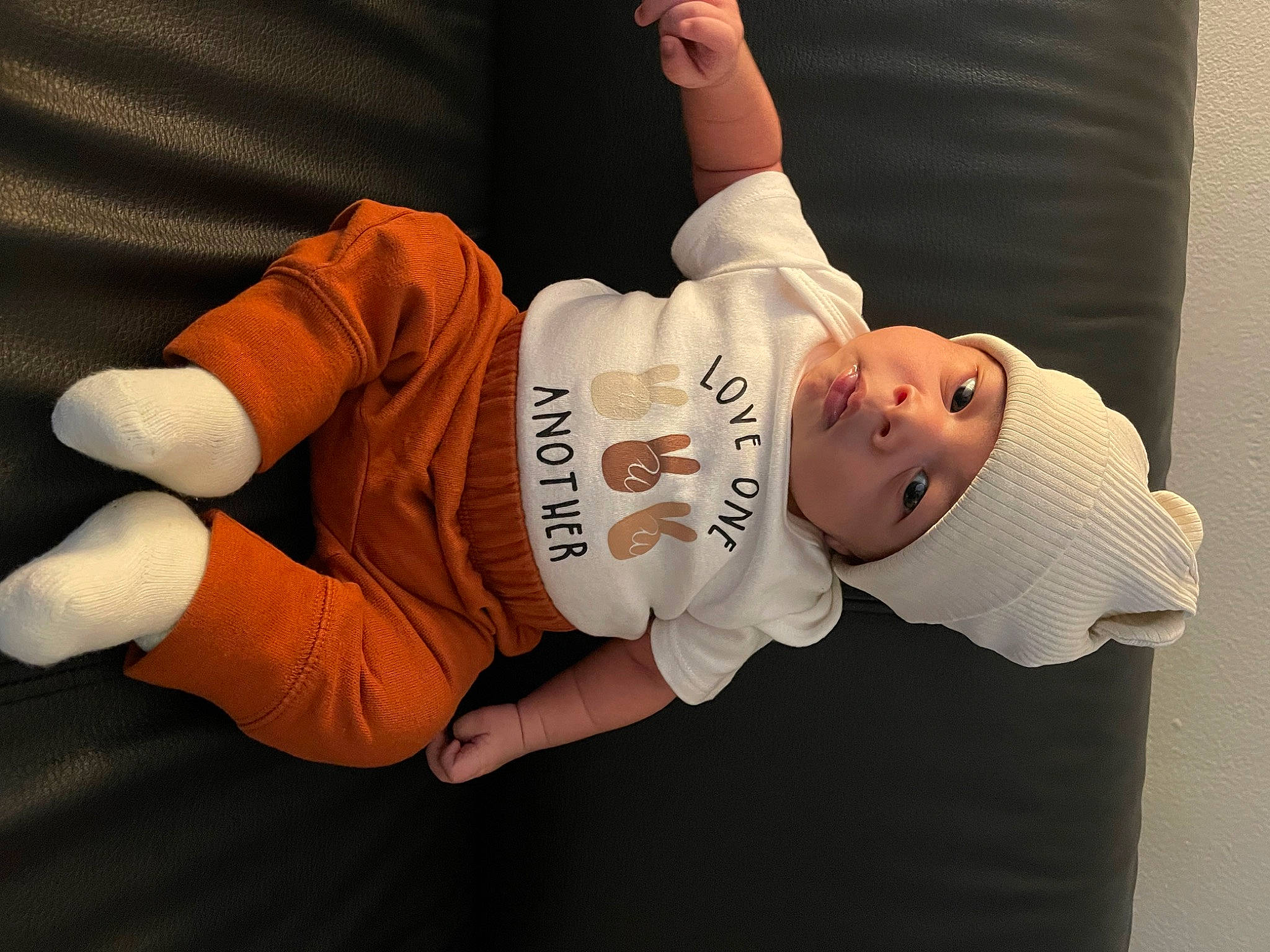 Naim joined the competition — help win amazing prizes! abdomen, baby_toddler_clothing, child, comfort, elbow, finger, foot, gesture, headwear, human_leg, joint, knee, person, room, sleeve, sock, sportswear, t_shirt, thigh, thumb