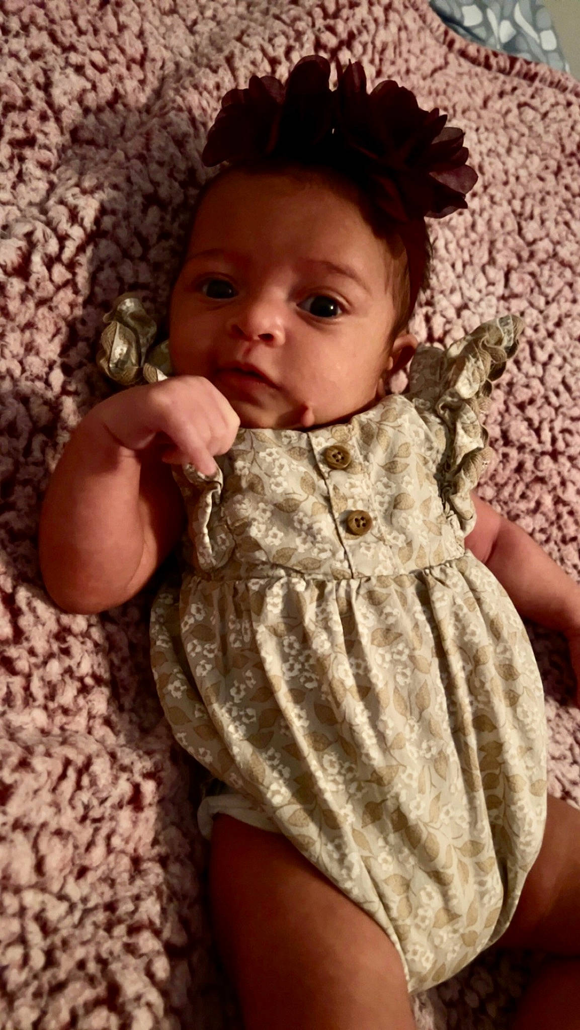 Talia is registered to the contest to win money with this photo: baby_toddler_clothing, blond, cheek, child, day_dress, embellishment, eye, finger, happy, head, iris, leg, lip, neck, one_piece_garment, person, pink, skin, sleeve, thigh