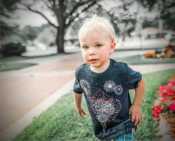 Orion is registered to the contest to win money with this photo: baby, baby_toddler_clothing, child, eye, face, flash_photography, flower, flowerpot, fun, grass, happy, leisure, pattern, people_in_nature, person, plant, recreation, sleeve, t_shirt, toddler