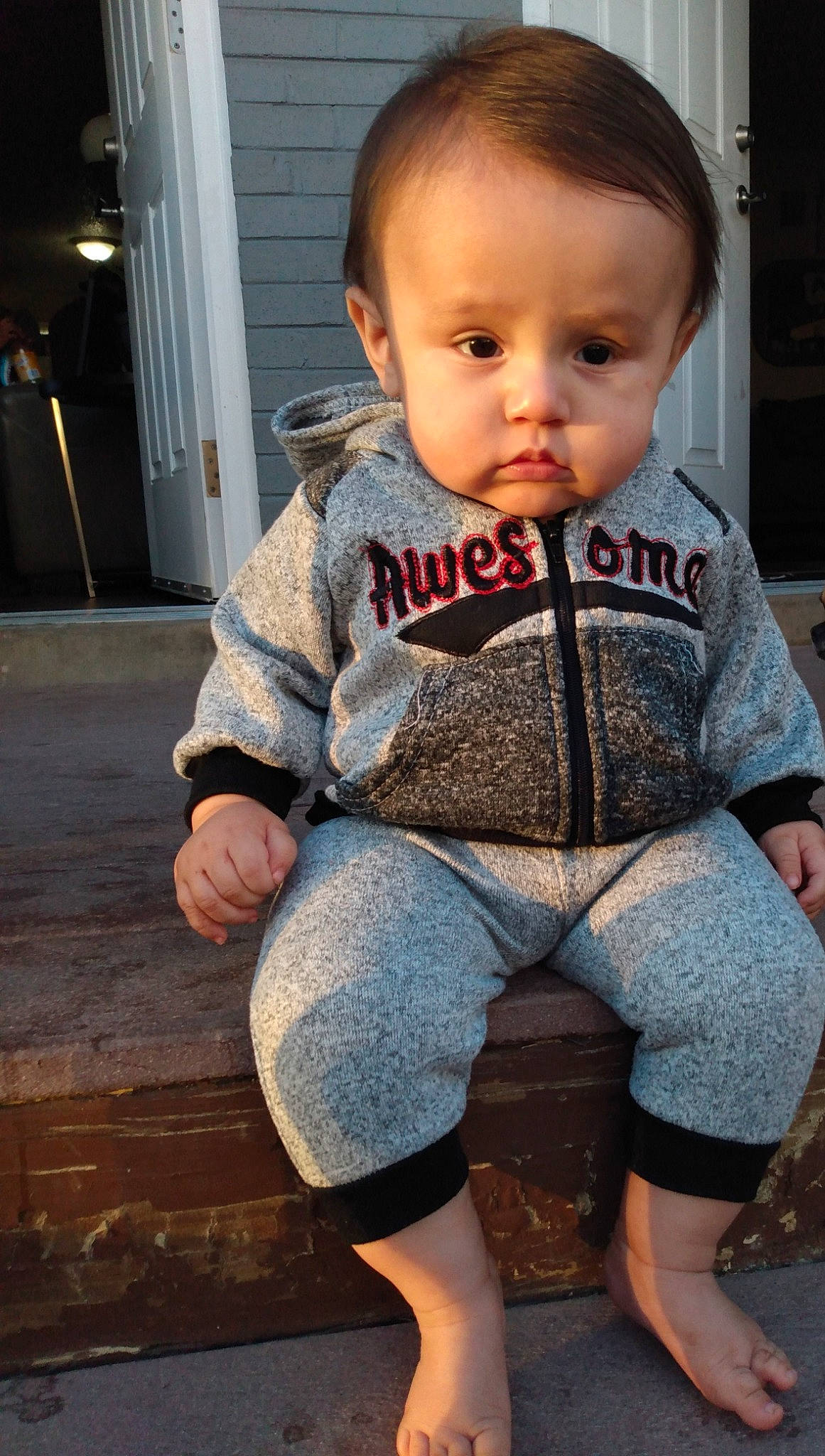 Manuel is registered to the contest to win money with this photo: baby, baby_toddler_clothing, child, person, sitting, skin, toddler