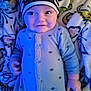 Houston joined the competition — help win amazing prizes! baby, infant, child, hat, onesie, blanket, patterned_blanket, blue_light, smiling, lying_down, cute, face, hands, clothing, headwear, portrait, happy, indoors, small_child, sleepwear