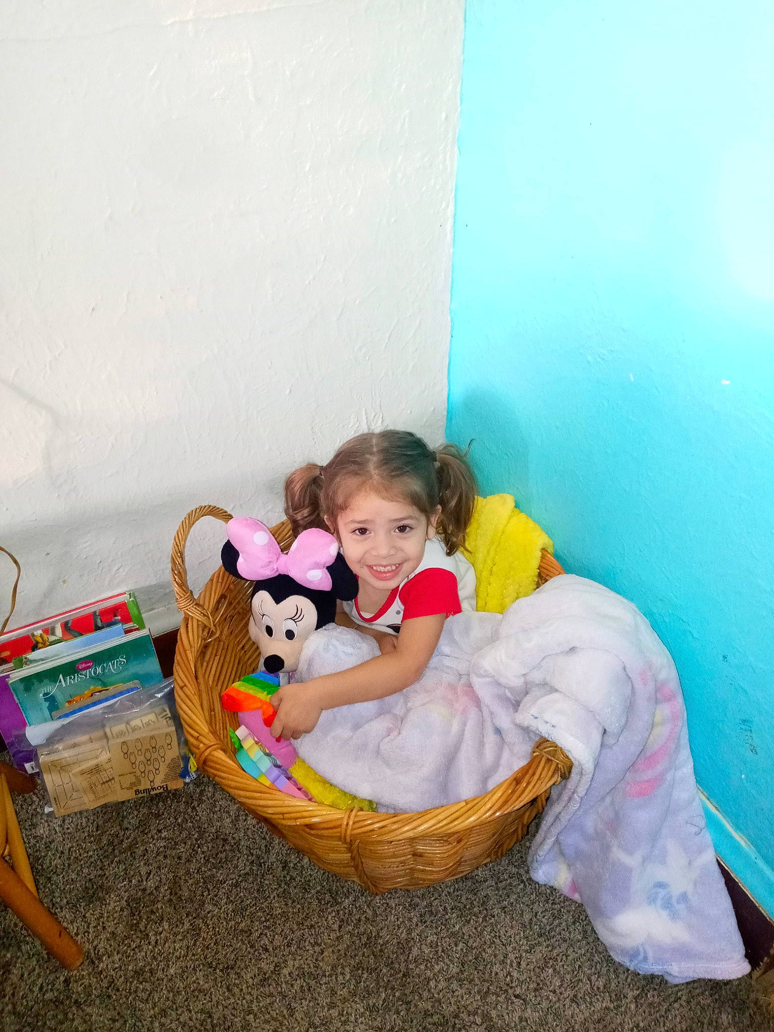 Ariel is registered to the contest to win money with this photo: baby, basket, child, comfort, fawn, flooring, flowerpot, fun, happy, joy, leisure, magenta, person, product, room, sitting, stuffed_toy, teddy_bear, toddler, toy
