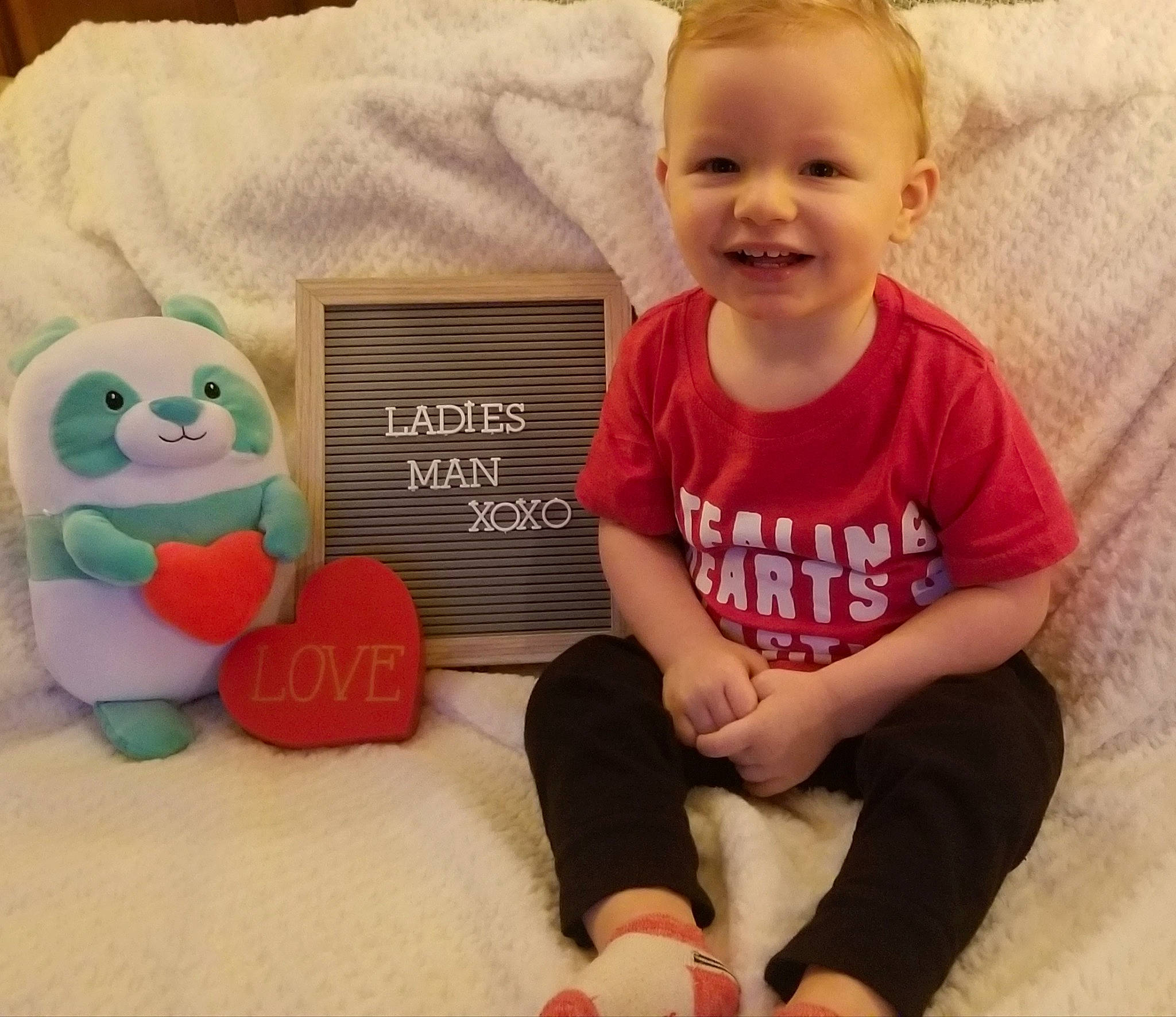 Layne joined the competition — help win amazing prizes! arm, baby, baby_playing_with_toys, baby_toddler_clothing, cheek, child, comfort, couch, facial_expression, finger, fun, hair, hairstyle, happy, head, joy, person, skin, sleeve, smile