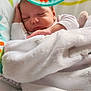 Hayden participe au concours pour gagner de l'argent avec cette photo : baby, sleeping, blanket, toy, colorful, infant, peaceful, cozy, soft, white, hand, face, nursery, pattern, child, cute, resting, head, indoor, comfort