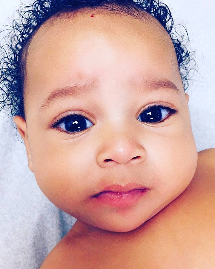 Da Khari is registered to the contest to win money with this photo: baby, beauty, cheek, child, chin, close_up, ear, eye, eyebrow, eyelash, face, forehead, head, iris, lip, mouth, nose, organ, person, skin