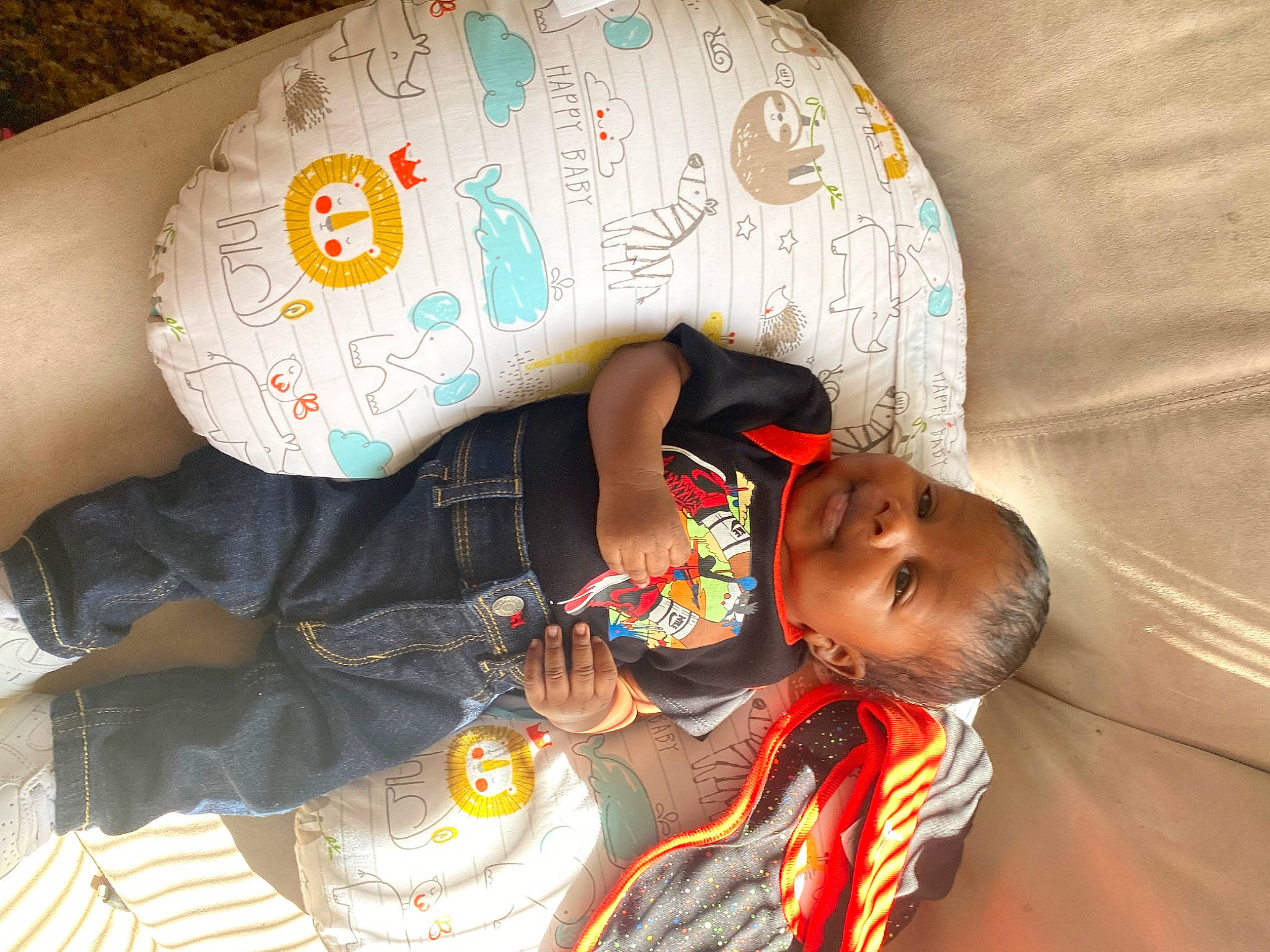 Mario is registered to the contest to win money with this photo: baby, baby_products, baby_toddler_clothing, child, comfort, linens, pattern, person, personal_protective_equipment, skin, sleeve, toddler