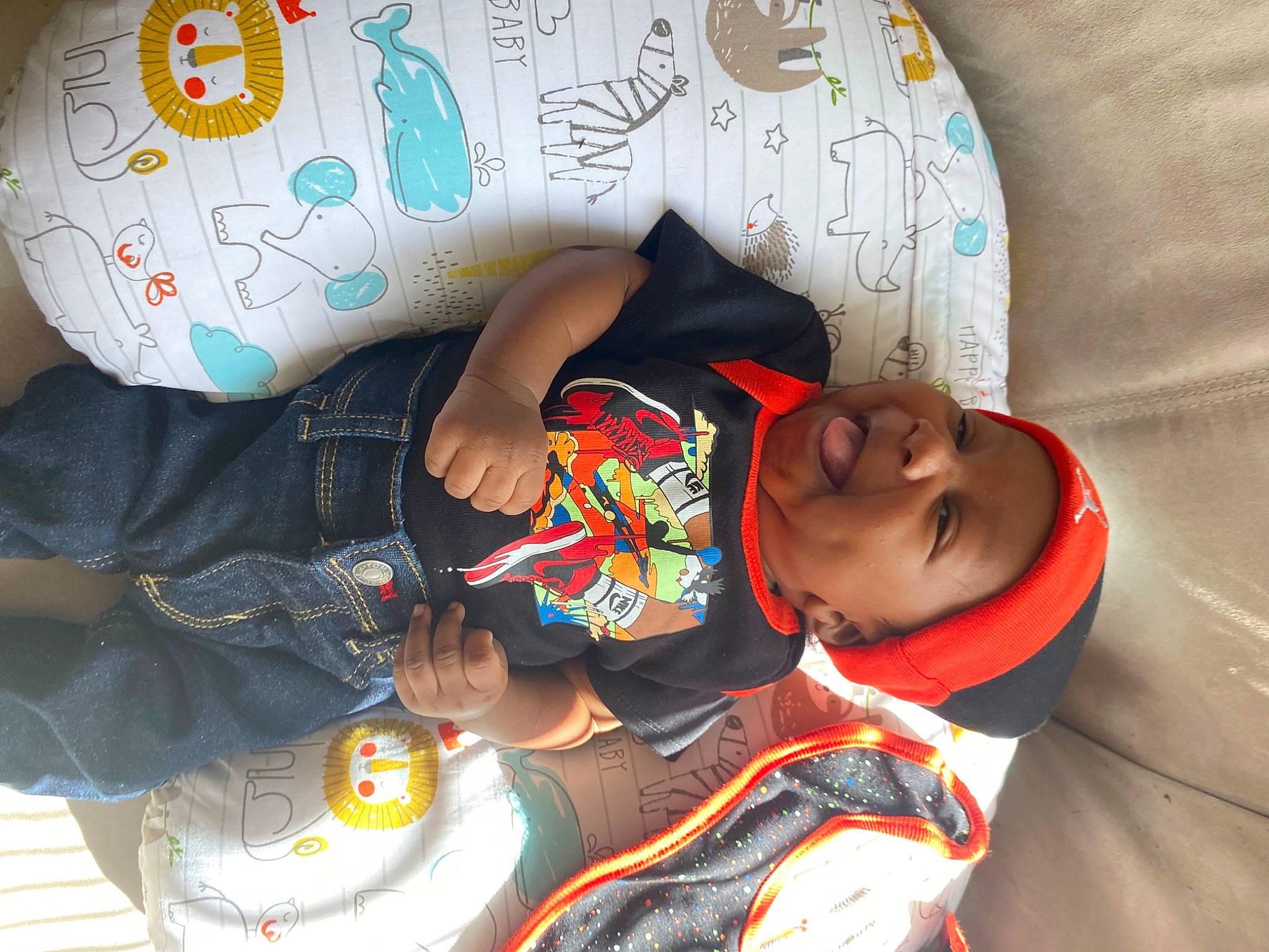 Mario joined the competition — help win amazing prizes! baby, baby_products, baby_toddler_clothing, carmine, child, comfort, elbow, happy, headgear, headwear, mouth, nail, pattern, person, personal_protective_equipment, product, room, sleeve, t_shirt, textile