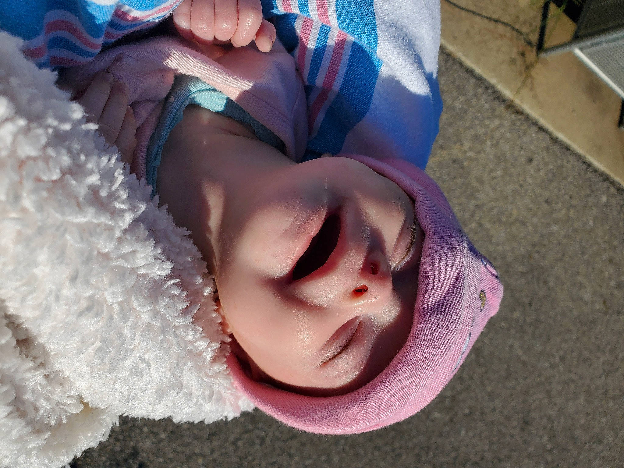 Mylah is registered to the contest to win money with this photo: baby, child, eye, eyelash, eyewear, facial_expression, finger, grass, hairstyle, happy, hat, headgear, lip, mammal, mouth, person, skin, smile, textile, toddler