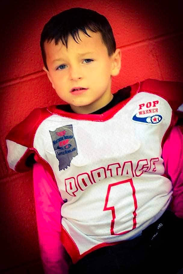 Braxton is registered to the contest to win money with this photo: baby, baby_toddler_clothing, carmine, cheek, child, fashion_design, flash_photography, font, fun, happy, jersey, long_sleeved_t_shirt, magenta, neck, nose, person, sleeve, sports_jersey, sportswear, t_shirt