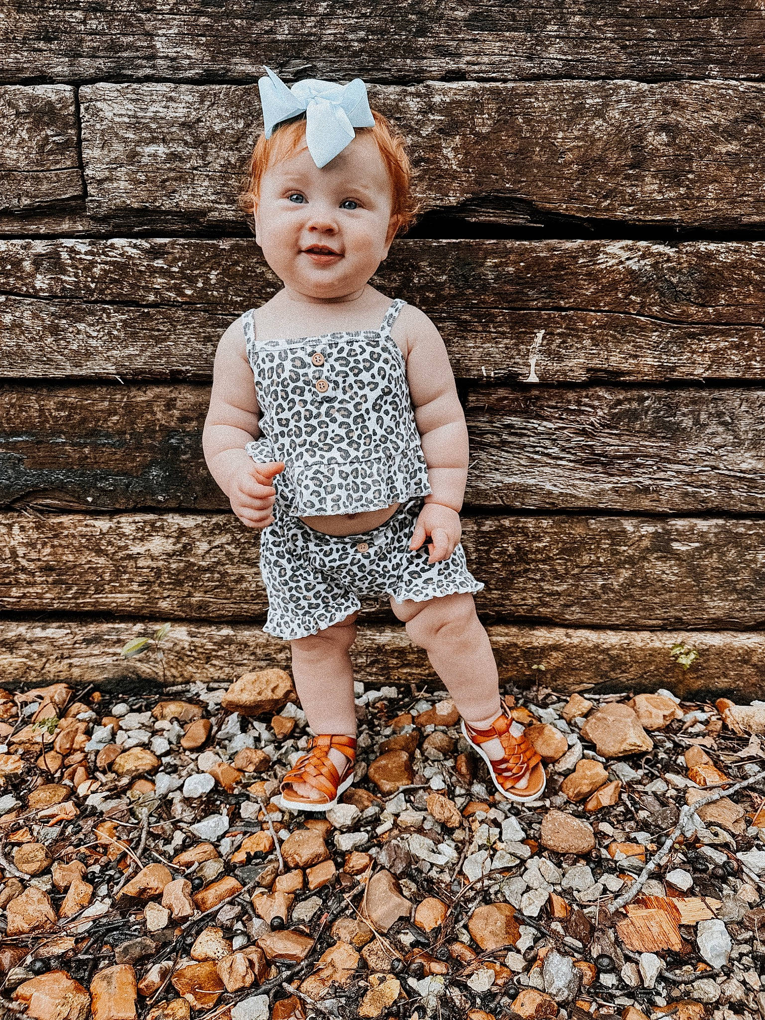 Payton is registered to the contest to win money with this photo: baby, baby_toddler_clothing, brick, child, eye, flash_photography, grass, happy, head, landscape, pattern, people_in_nature, person, sitting, smile, soil, stock_photography, t_shirt, toddler, wall