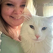 Fred joined the competition — help win amazing prizes! woman, cat, white_cat, smiling, portrait, indoor, long_hair, light, window, feline, pet, happy, cute, closeup, cozy, domestic, face, friendly, human, animal