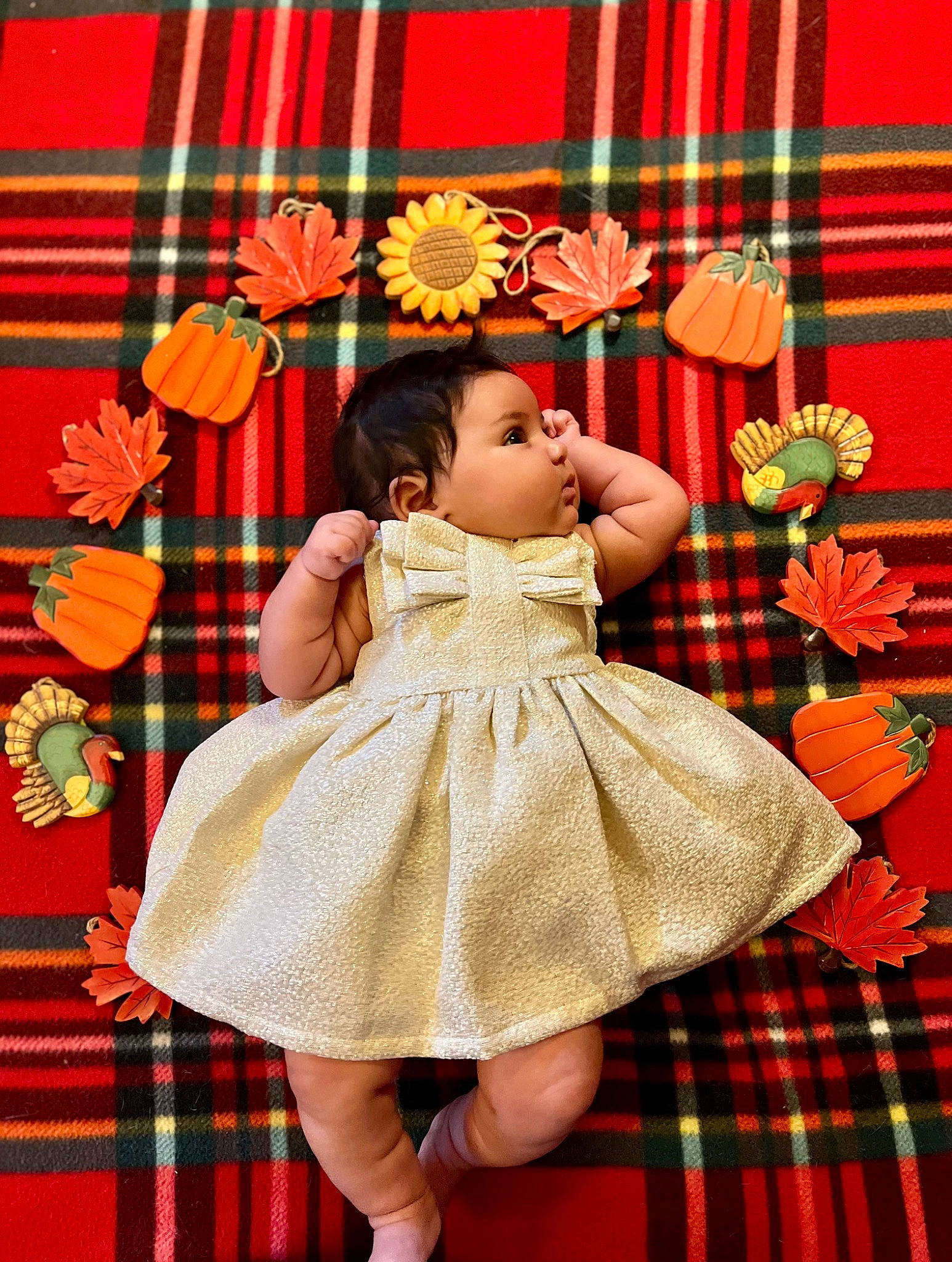 Kilah is registered to the contest to win money with this photo: baby_toddler_clothing, child, day_dress, dress, event, fashion_design, happy, lighting, magenta, one_piece_garment, pattern, peach, person, pink, plaid, red, room, tartan, textile, toddler