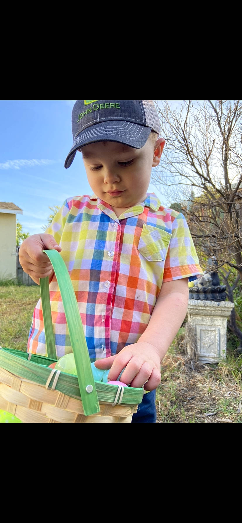 Anakin is registered to the contest to win money with this photo: baseball_cap, cap, child, cool, fun, grass, happy, hat, headwear, leisure, people_in_nature, person, photograph, plaid, plant, sky, sleeve, snapshot, street_fashion, t_shirt