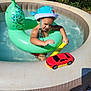 Lyham a rejoint le concours — aidez-le/la à gagner de superbes lots ! child, toddler, pool, inflatable_pool, swim_ring, dinosaur_float, toy_car, sunhat, outdoor, water, summer, play, fun, sunny, green, red, yellow, plastic, happy, water_toy