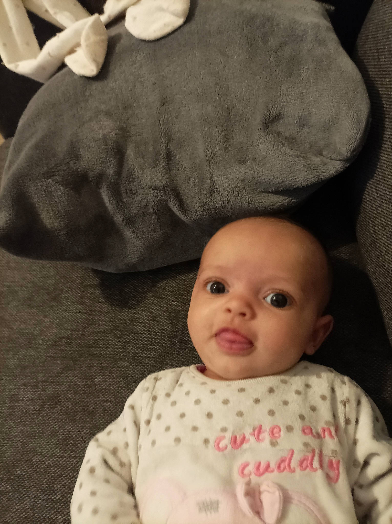 Naya participe au concours pour gagner de l'argent avec cette photo : baby, baby_sleeping, baby_toddler_clothing, black, cheek, child, comfort, eye, face, fashion_accessory, gesture, head, iris, linens, lip, person, photograph, skin, sleeve, toddler