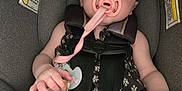 Xalia joined the competition — help win amazing prizes! baby, sleeping, car_seat, pacifier, black_bow, infant, child, clothing, hand, money, safety_harness, cute, face, resting, indoors, person, young_child, seat, skin, nap