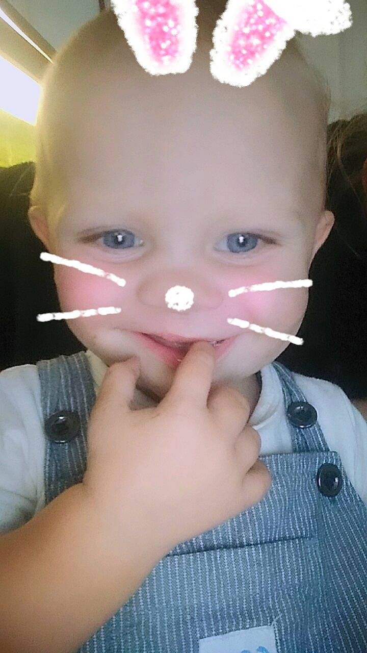 Lachlan is registered to the contest to win money with this photo: cheek, child, chin, ear, eye, eyebrow, face, finger, forehead, gesture, head, jaw, lip, mouth, nail, nose, person, pink, skin, smile