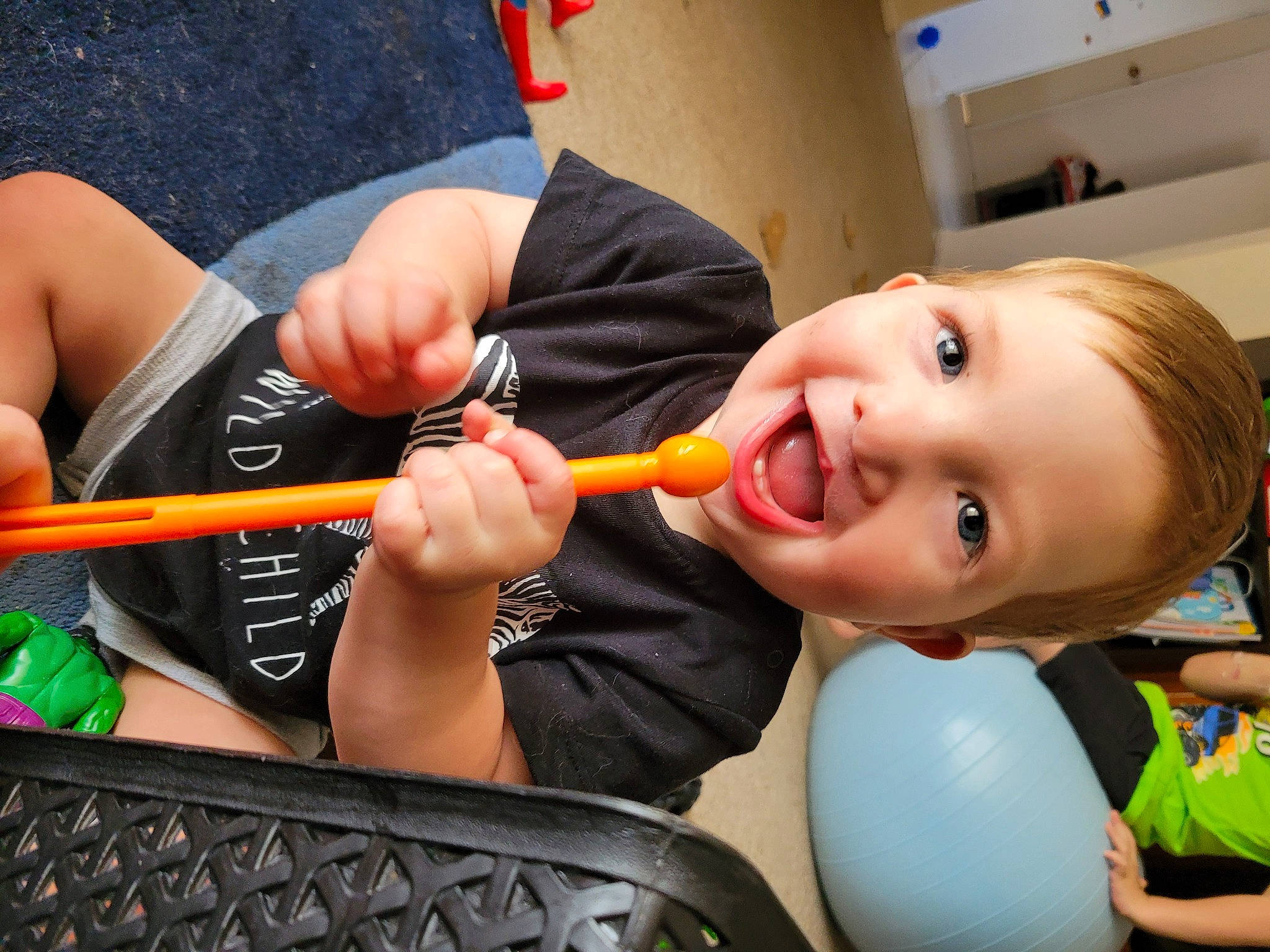 Mason is registered to the contest to win money with this photo: baby, baby_products, baby_toys, balloon, brush, chest, fun, happy, leisure, nail, party_supply, person, play, recreation, room, smile, tableware, toddler, toy