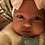 Naya a rejoint le concours — aidez-le/la à gagner de superbes lots ! baby, infant, headband, bow, pacifier, knitted_sweater, closeup, face, hand, beads, accessory, cute, child, portrait, indoor, soft_lighting, skin, expression, newborn, person
