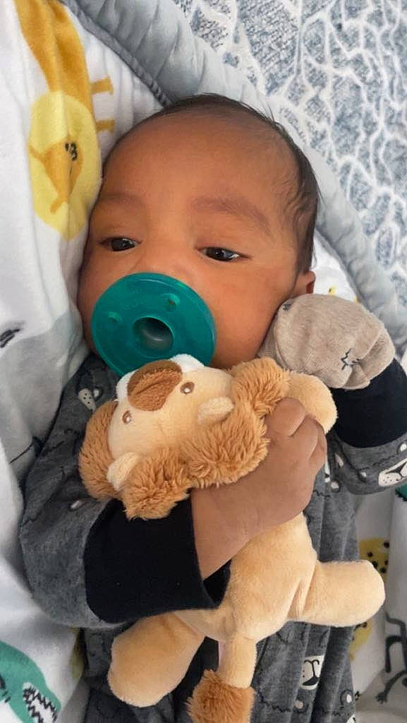 Oliver is registered to the contest to win money with this photo: baby, baby_products, baby_safety, baby_sleeping, cheek, child, comfort, eye, eyelash, head, human_body, linens, mouth, nose, person, room, service, skin, textile, toddler