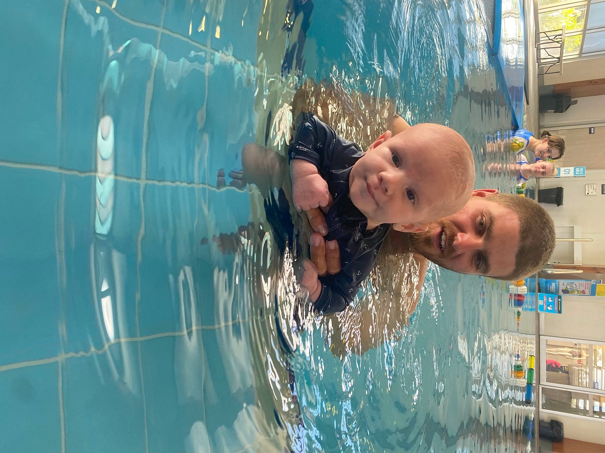 Jasper is registered to the contest to win money with this photo: bathing, child, fluid, fun, glass, happy, joy, leisure, leisure_centre, liquid_bubble, person, play, recreation, reflection, smile, swimming_pool, toddler, vacation, water, water_feature