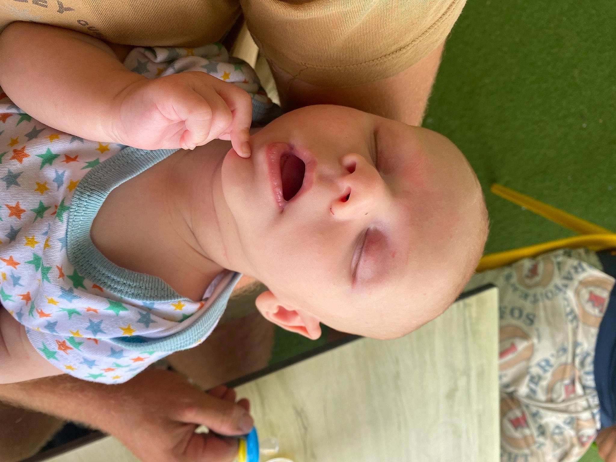 Jasper is registered to the contest to win money with this photo: baby, baby_products, baby_toddler_clothing, cheek, chest, child, comfort, eye, eyelash, finger, fun, hand, happy, lip, mouth, neck, nose, person, skin, thumb