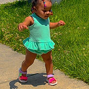 Delynn joined the competition — help win amazing prizes! casual, child, cute, daylight, grass, green_dress, hair_beads, happy, outdoor, person, playful, sandals, shadow, sidewalk, summer, sunlight, toddler, trash_bin, walking, young_child