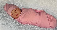 Eliana joined the competition — help win amazing prizes! baby, bed, blanket, bonnet, cap, clothing, face, furniture, glove, happy, hat, head, newborn, person, photography, portrait, sleeping, sleeve, smile, yawning
