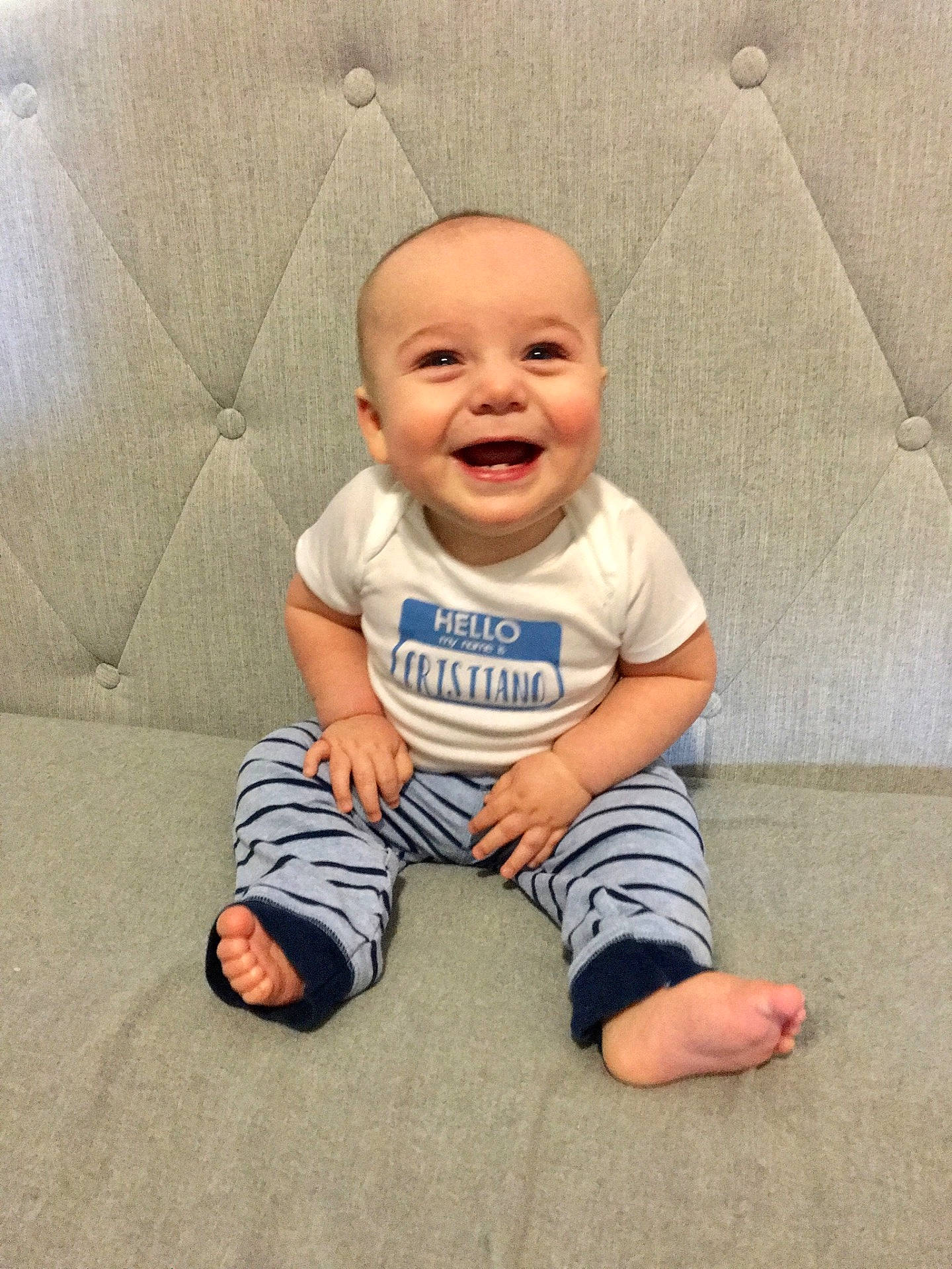 Cristiano joined the competition — help win amazing prizes! arm, boy, child, day, fun, hand, infant, joy, person, play, product, sitting, smile, standing, t_shirt, toddler