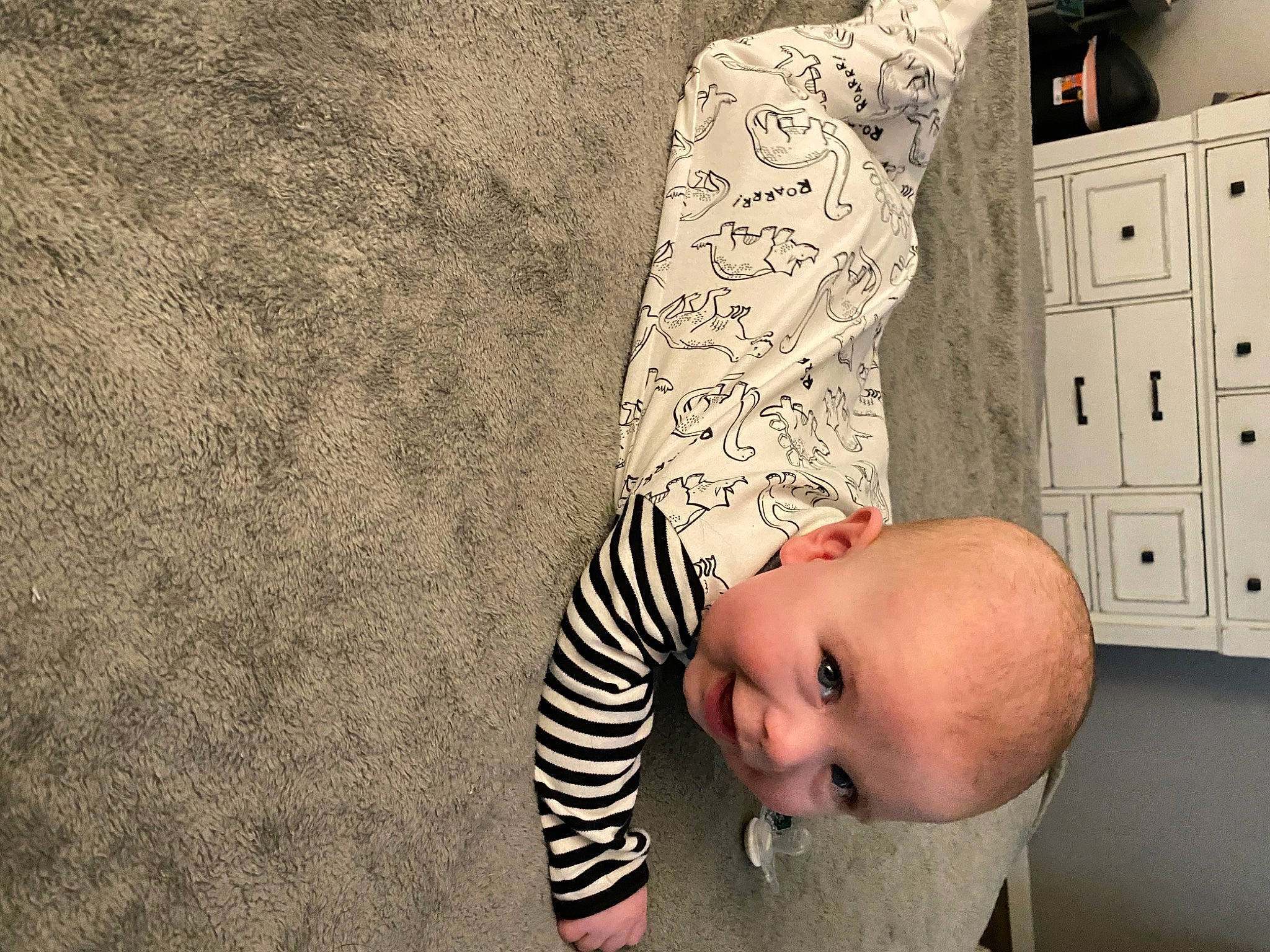 Coen joined the competition — help win amazing prizes! art, baby, baby_toddler_clothing, cabinetry, chest, chest_of_drawers, child, drawer, dresser, floor, flooring, happy, home_appliance, mammal, pattern, person, textile, toddler, toy, wall