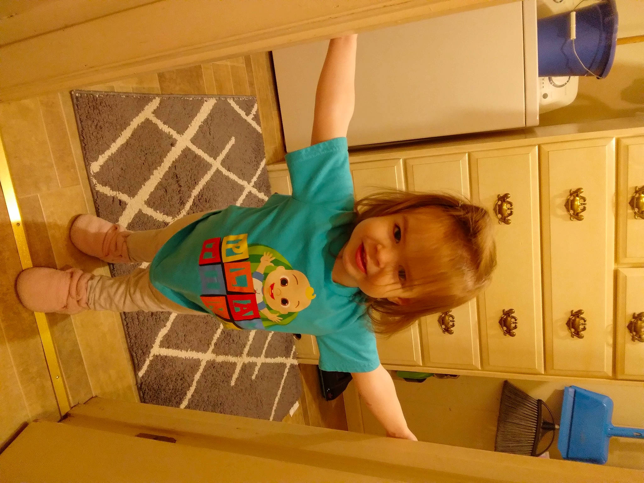 Ericka is registered to the contest to win money with this photo: baby, baby_safety, baby_toddler_clothing, ceiling, child, comfort, flooring, fun, happy, hardwood, leisure, pattern, person, play, room, t_shirt, thumb, toddler, wood