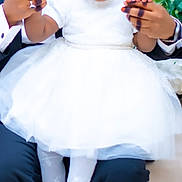 Retaan joined the competition — help win amazing prizes! child, man, tuxedo, white_dress, holding_hands, smile, sitting, formal, portrait, indoor, curly_hair, flower_decor, white_shoes, stockings, black_jacket, happy, family, celebration, people, cute