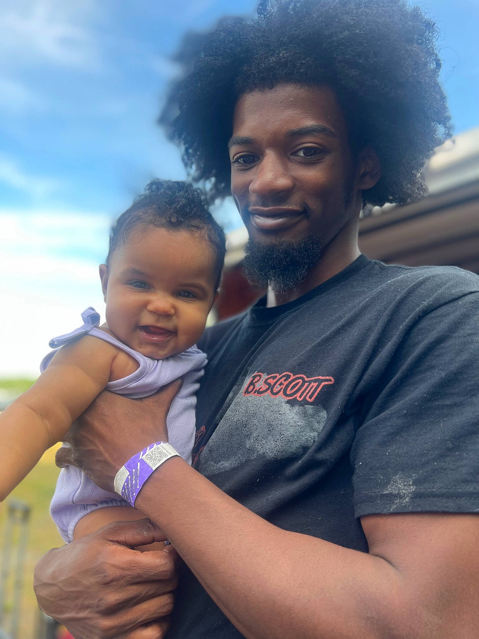 Brielle joined the competition — help win amazing prizes! afro, baby, baby_toddler_clothing, child, cloud, cool, event, fun, gesture, grass, hair, hairstyle, happy, jewellery, jheri_curl, joy, person, sky, smile, t_shirt