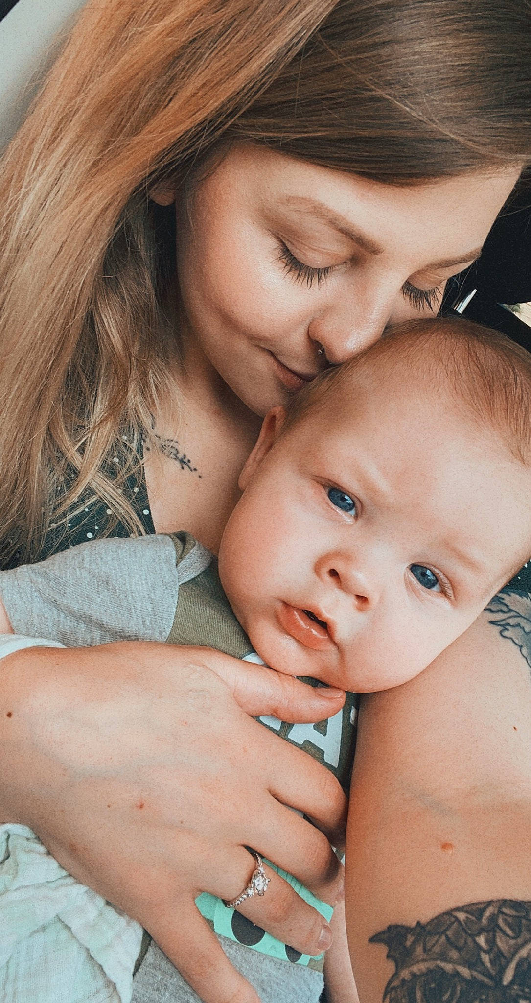 Jameson is registered to the contest to win money with this photo: cheek, eyelash, facial_expression, finger, gesture, hair, hand, happy, human, interaction, iris, lip, mammal, mouth, nose, organ, person, photograph, plant, skin