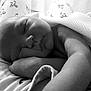 Eli is registered to the contest to win money with this photo: baby, newborn, sleeping, blanket, arm, face, peaceful, rest, monochrome, closeup, infant, soft_light, blanket_texture, bed, comfort, portrait, relaxation, skin, cozy, quiet