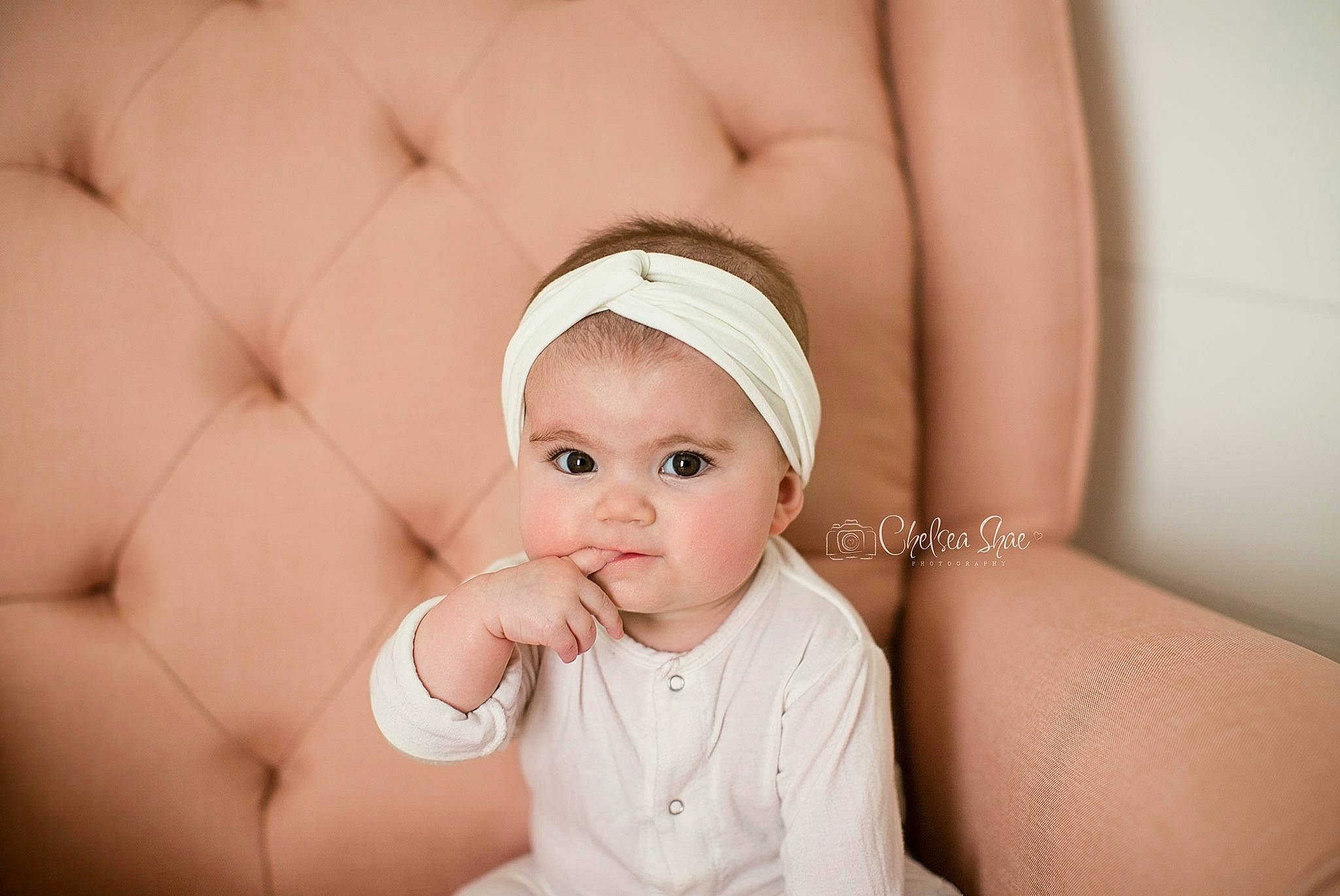 Anniston is registered to the contest to win money with this photo: baby, cheek, child, finger, flesh, hand, headgear, muscle, person, photography, skin, stomach, toddler