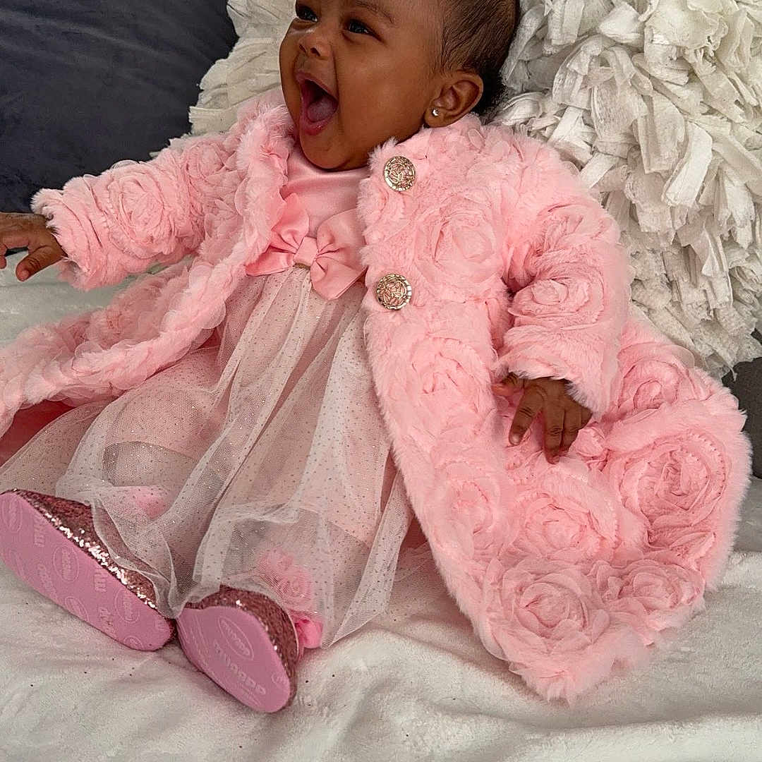 Zuhrii joined the competition — help win amazing prizes! baby, blanket, child, cozy, cute, dress, earrings, fabric, furniture, happy, home, indoor, infant, pillow, pink_coat, portrait, shoes, sitting, smiling, soft_texture