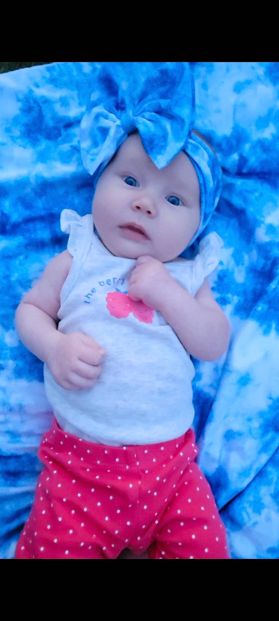 Clover is registered to the contest to win money with this photo: aqua, azure, baby, baby_toddler_clothing, blue, clothing, eye, face, happy, hat, headwear, lip, people_in_nature, person, photograph, pink, purple, skin, sleeve, textile