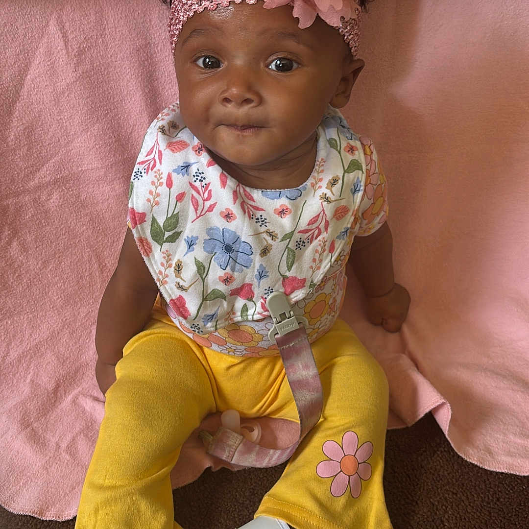 Jazhani joined the competition — help win amazing prizes! accessories, baby, cap, clothing, couch, cushion, face, footwear, furniture, hat, head, headband, hosiery, pants, person, photography, portrait, shoe, sitting, sock