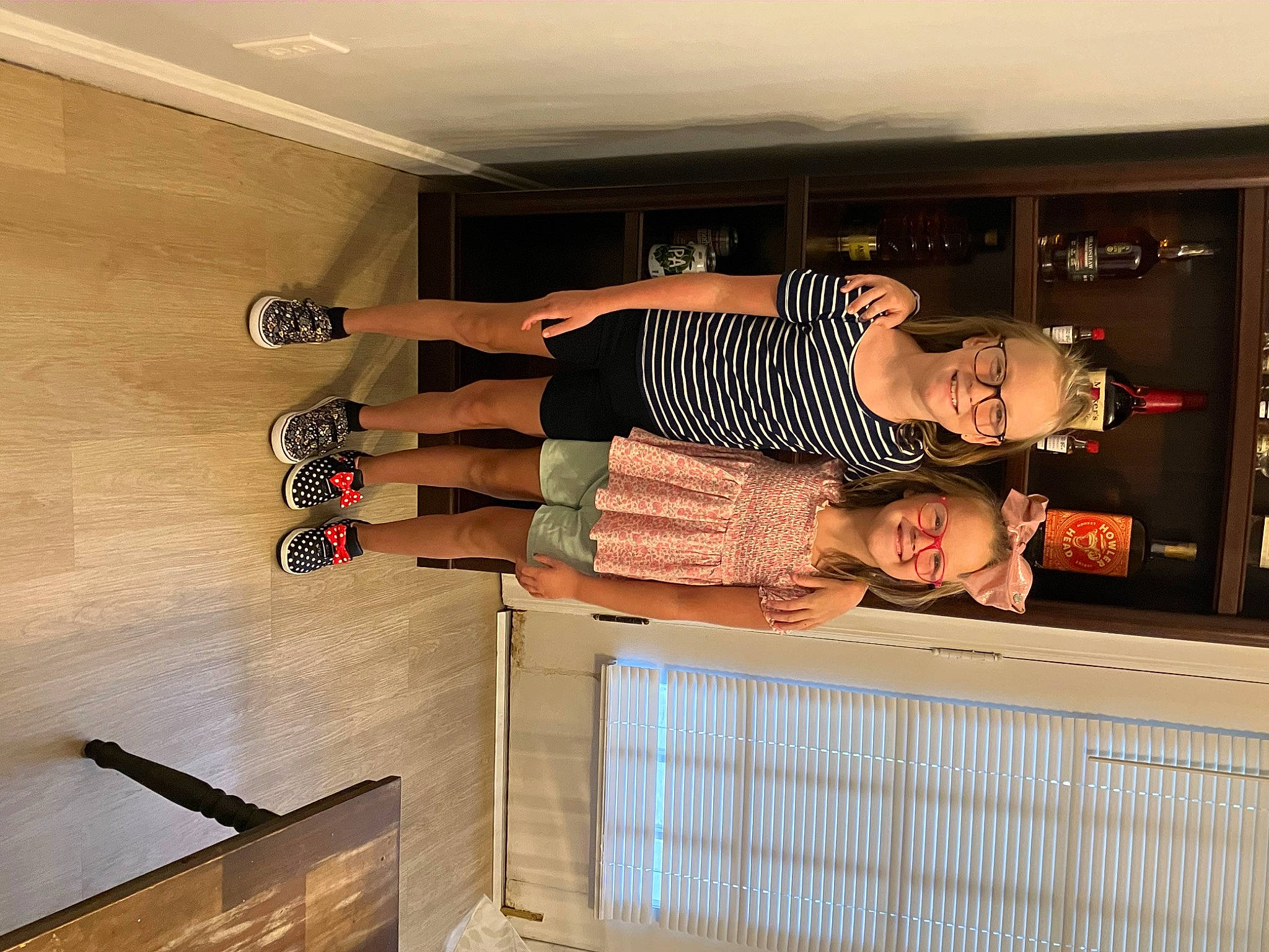 Krislynn joined the competition — help win amazing prizes! building, cabinetry, ceiling, child, dress, flooring, hardwood, home_appliance, house, human_leg, interior_design, joy, person, room, shelf, shelving, smile, stairs, thigh, toddler