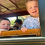 child, boy, smiling, window, wood, train, outdoor, daylight, happy, face, people, family, cap, background, couple, nature, greenery, casual, portrait, candid