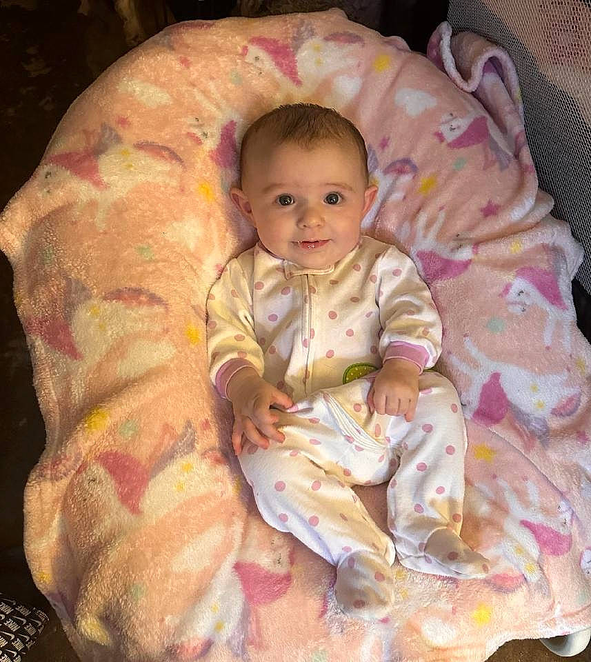 Summer joined the competition — help win amazing prizes! arm, baby, baby_carriage, baby_products, baby_toddler_clothing, cheek, child, comfort, eye, face, head, human_body, iris, linens, person, pink, sitting, skin, sleeve, smile