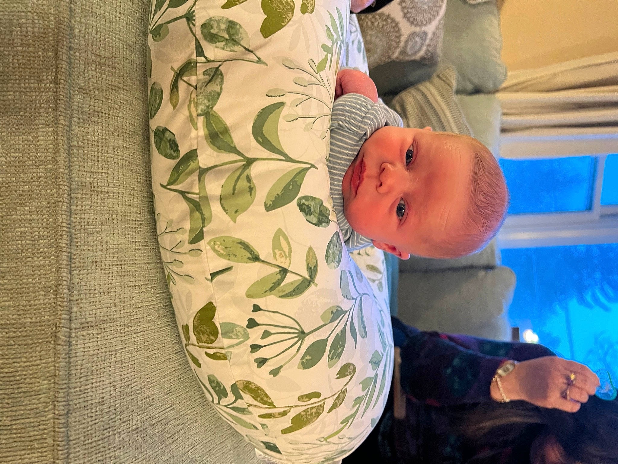 Christopher joined the competition — help win amazing prizes! baby, baby_products, baby_safety, baby_toddler_clothing, child, circle, comfort, hand, hat, linens, pattern, person, room, sleeve, smile, textile, toddler, wood, woven_fabric