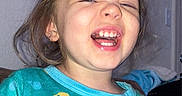 Harper is registered to the contest to win money with this photo: baby, babylaughing, bodypart, clothing, face, furniture, happy, head, indoors, knitwear, laughing, mouth, pajamas, person, photography, portrait, selfie, smile, t_shirt, teeth